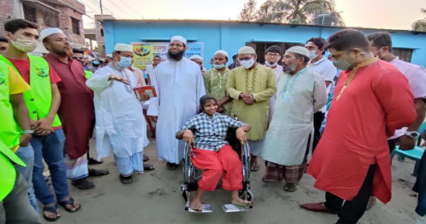 মামুদপুর সোনালী সংসদের উদ্যোগে অটোরিকশা ও হুইল চেয়ার বিতরণ